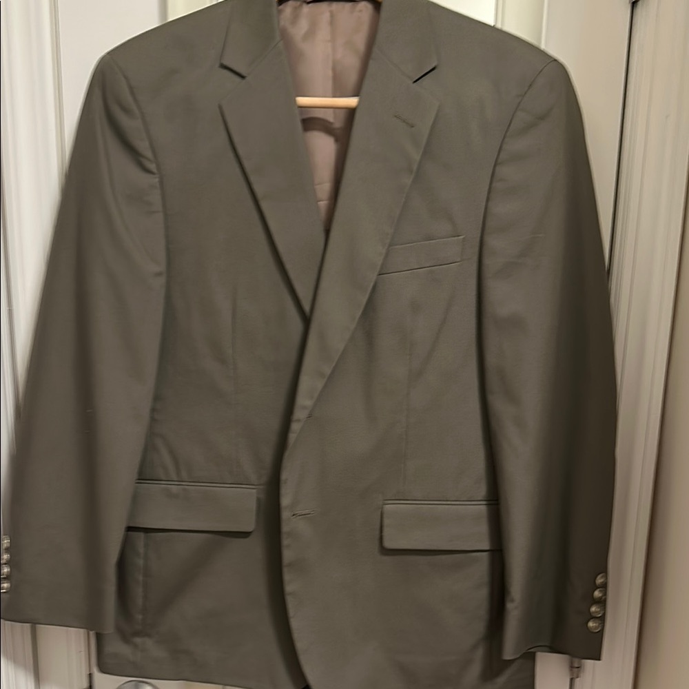 Tan Sport Coat with Notched Lapels and Textured Fabric